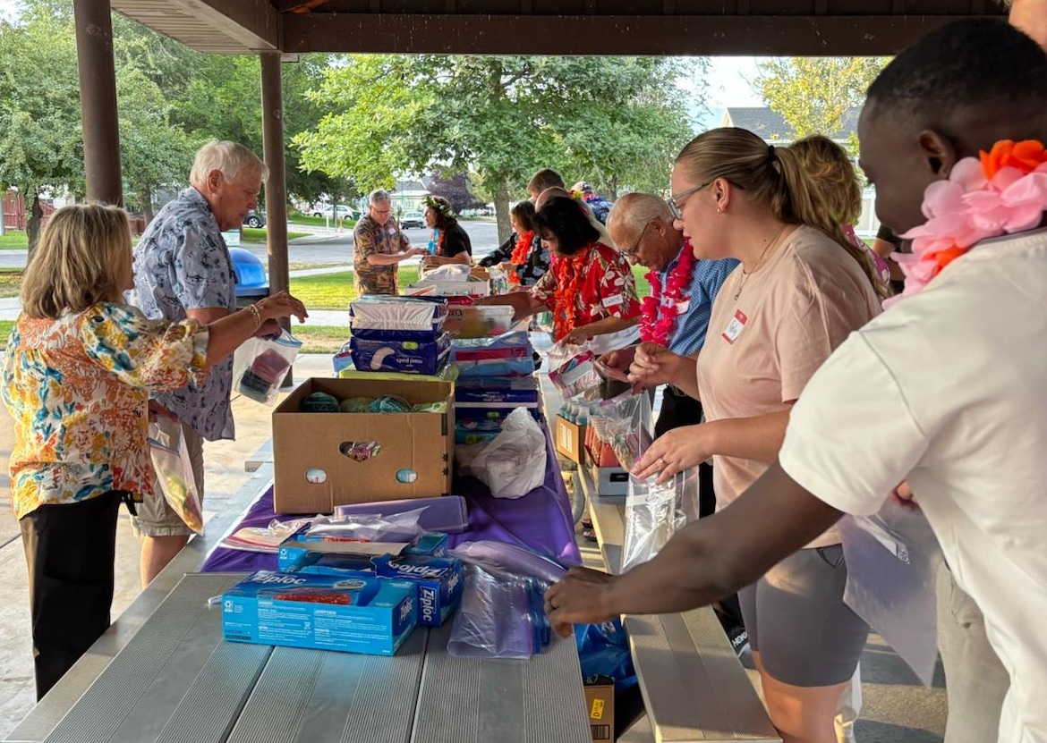 Volunteers assemble hygiene kits 