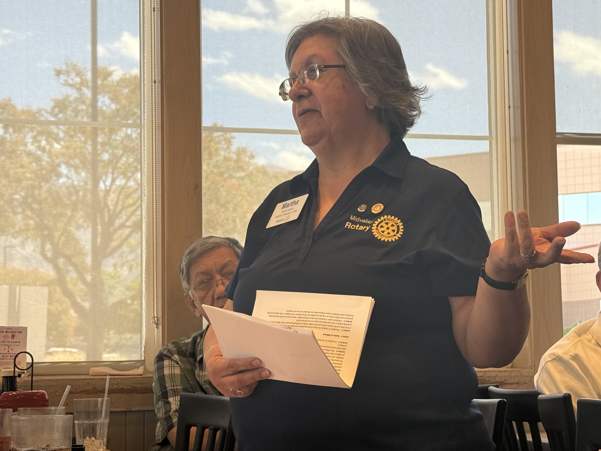 Martha Velasco, Partner of a Past District Governor, engages attendees with a presentation