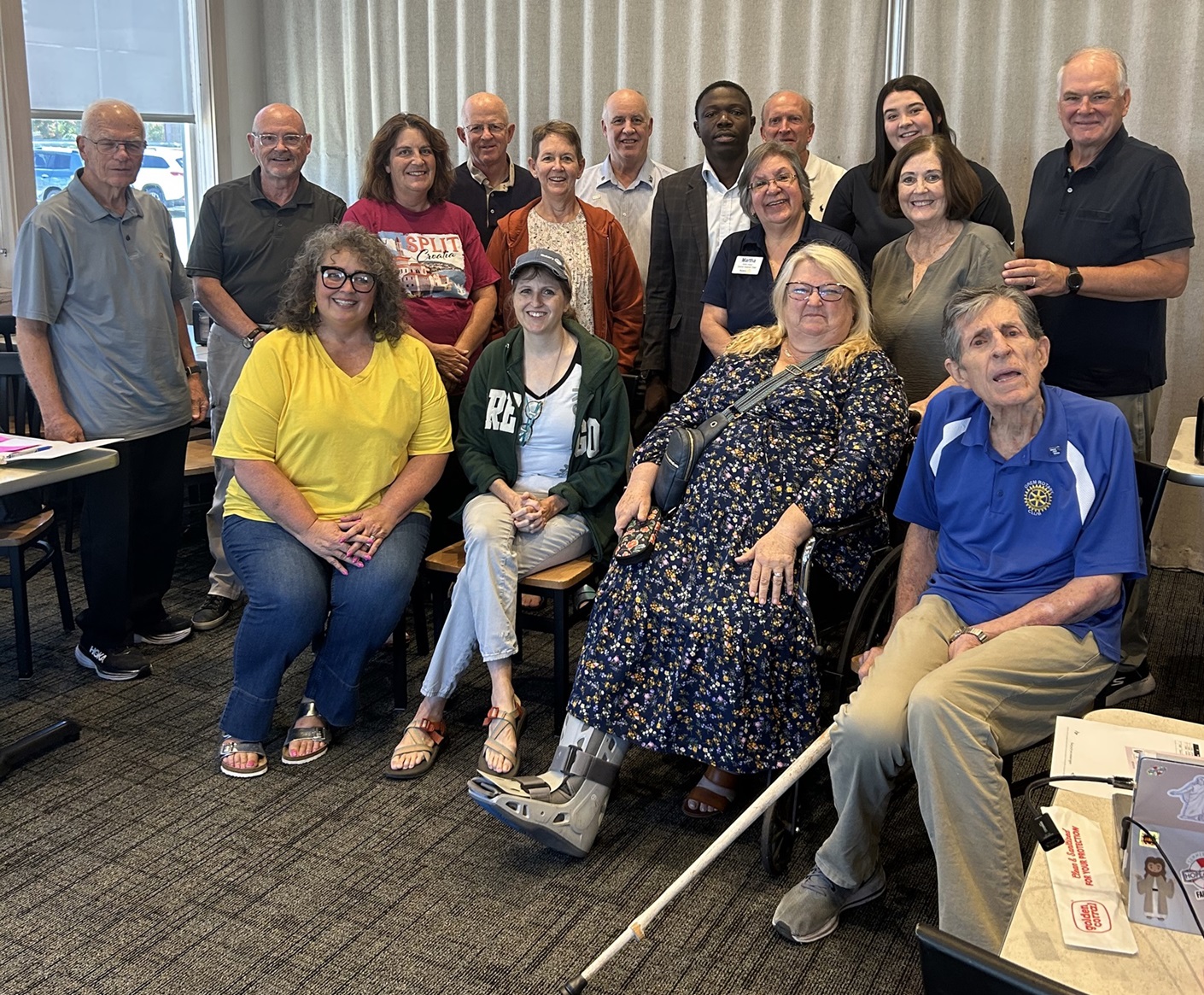 Savannah Bristol and Martha Valance pose with Orem-Lindon Rotary Club members
