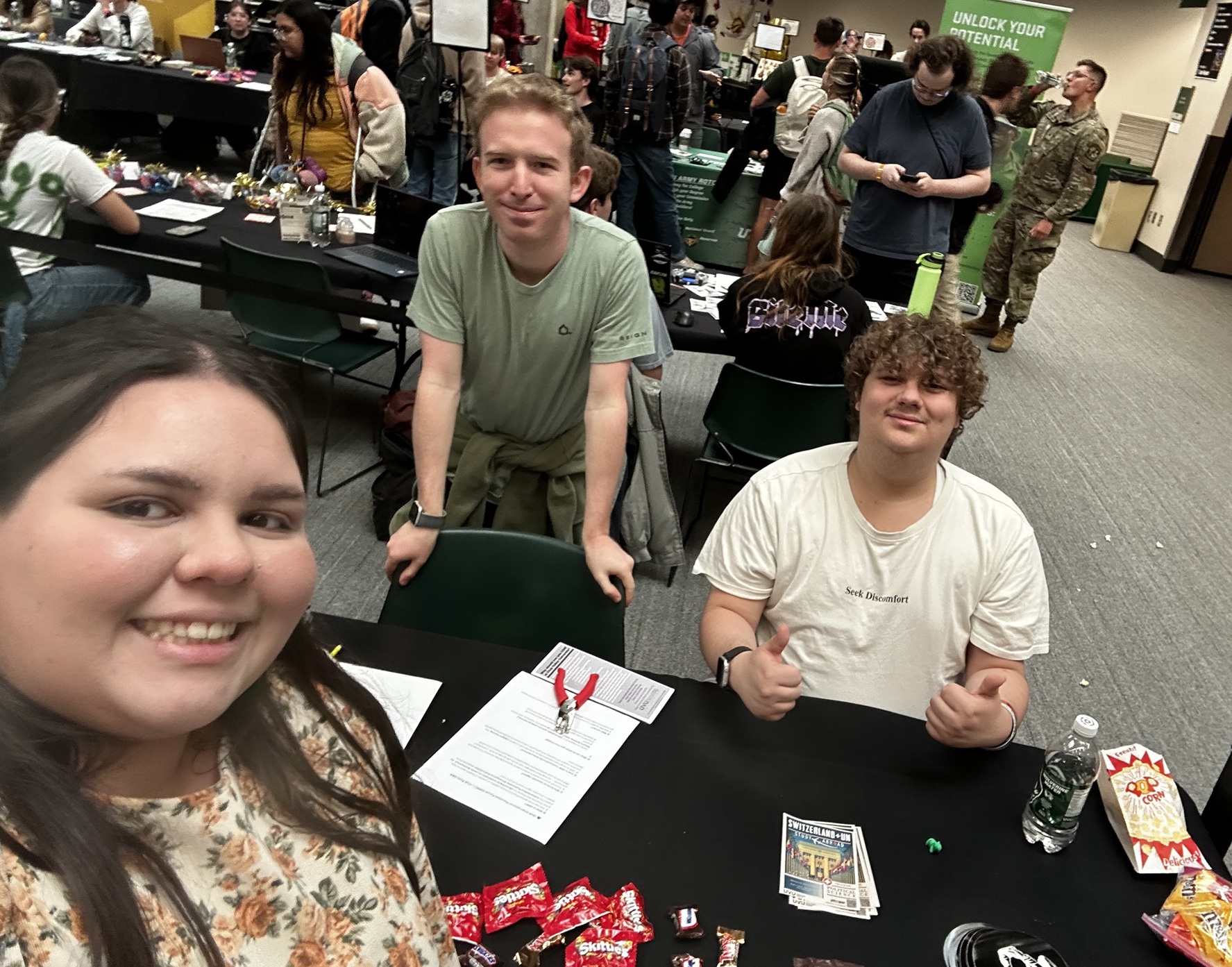 Group Photo of UVU Rotaractors Sam Olesen and Aemish Brock with Natalia Figueroa