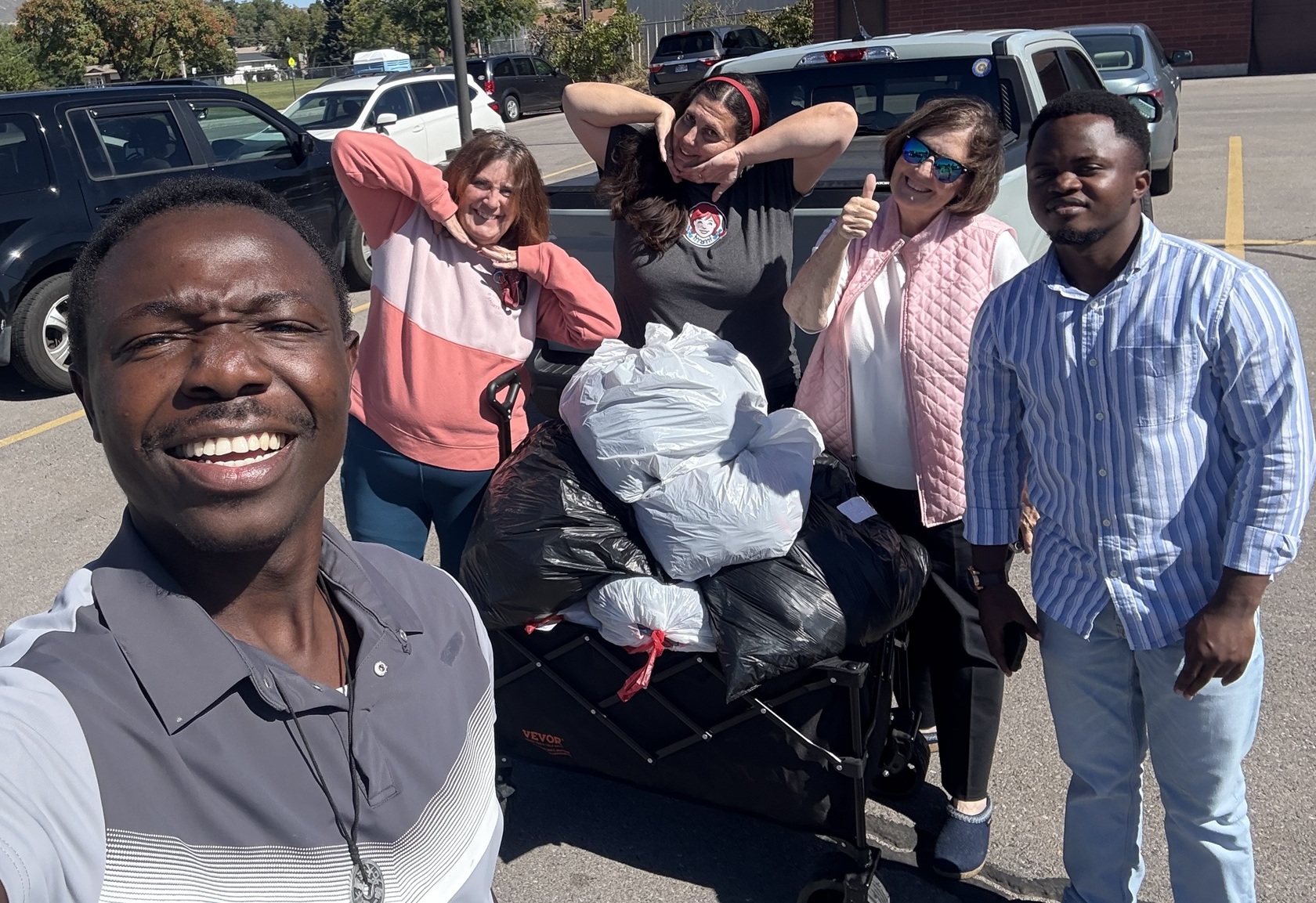 rem-Lindon Rotary Club Members and UVU Rotaract club Members in Action To serve Elementary schools.