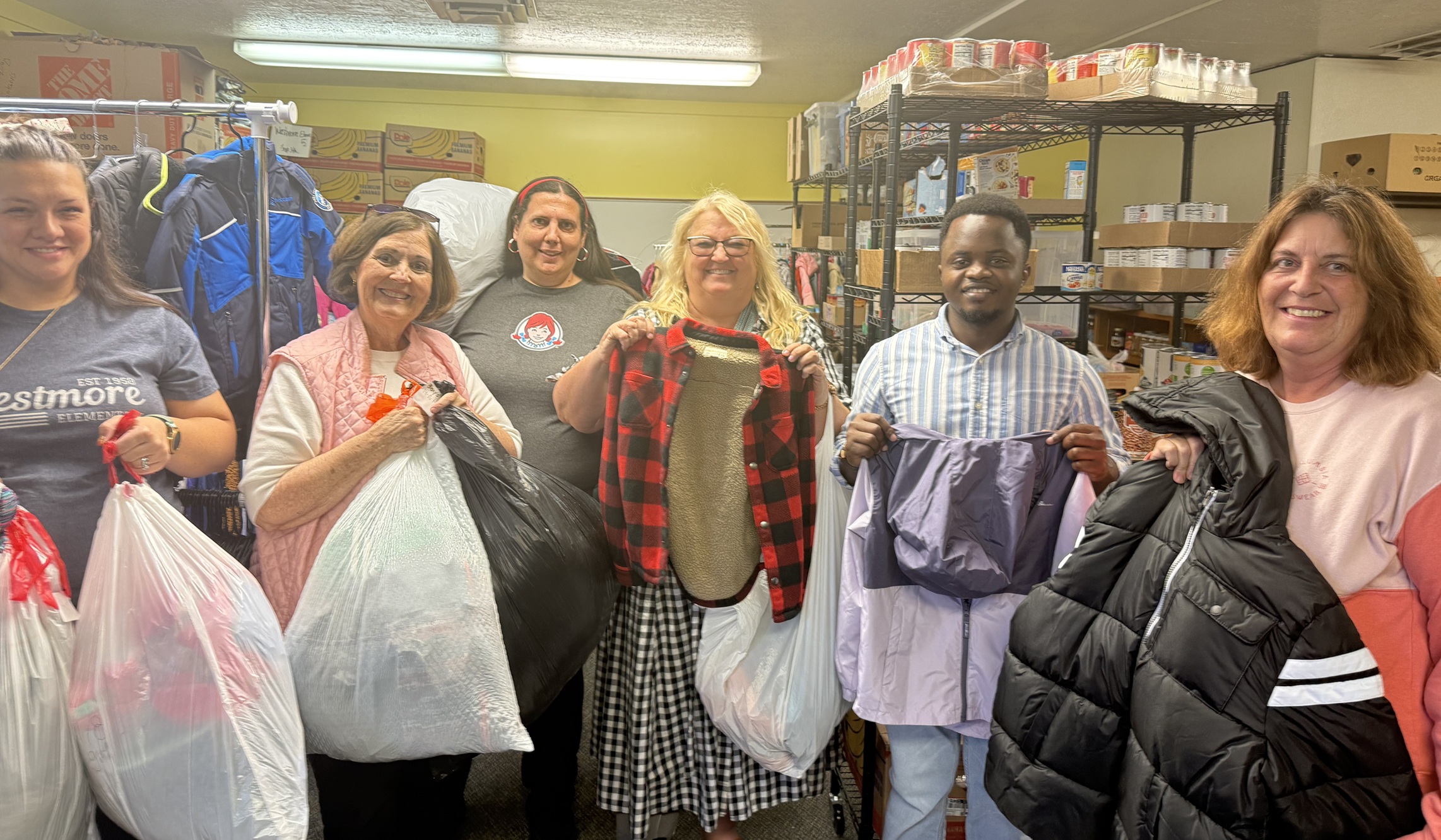 lub Members and students: Sheryl Merkley, Kabongo, Debby Lauret, Erynn Lammi, Cherryl,  & staff from Westmore, including Alyson Madsen