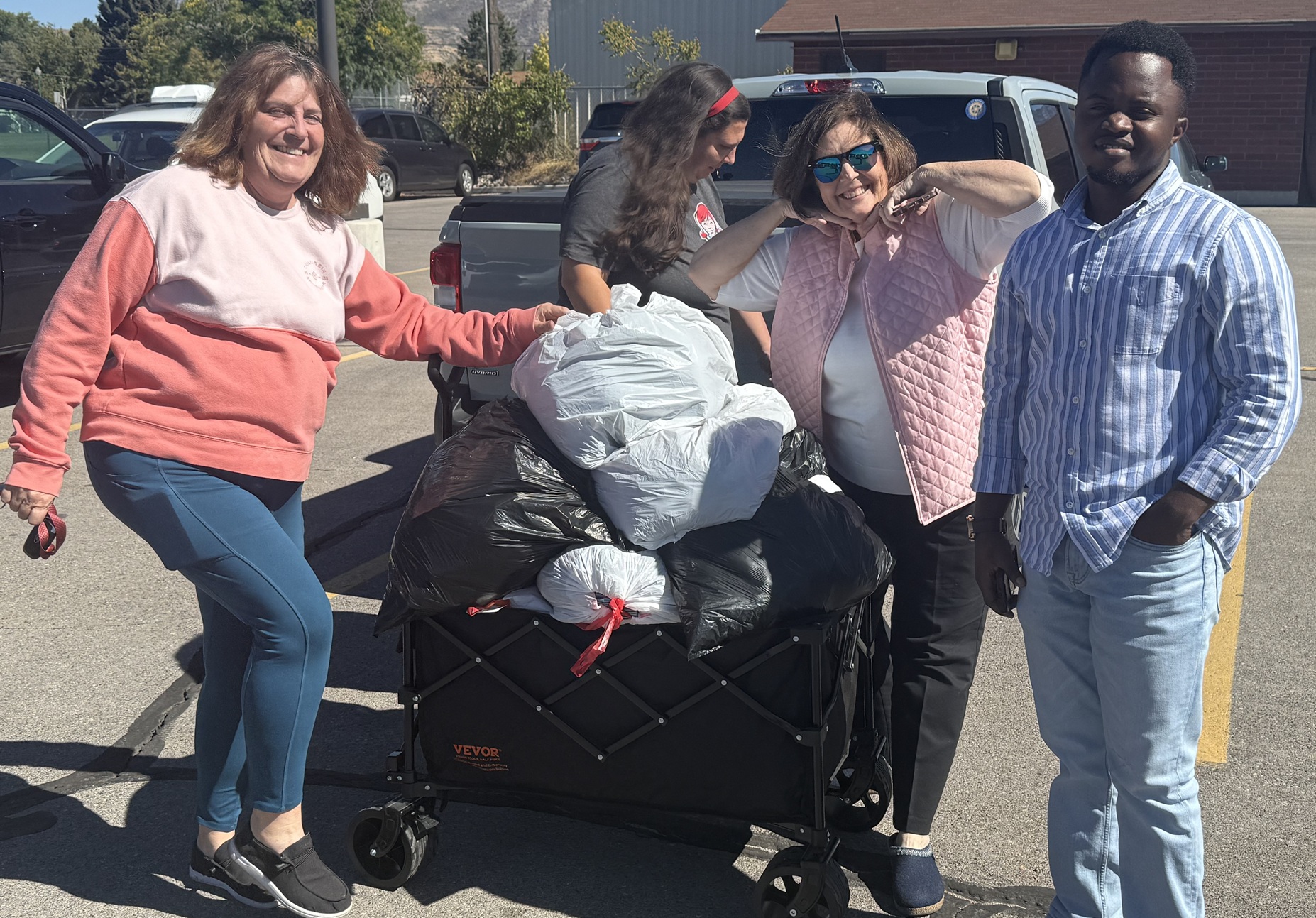 Orem-Lindon Rotary Club Members and UVU Rotaract club Members in Action To serve Elementary schools.