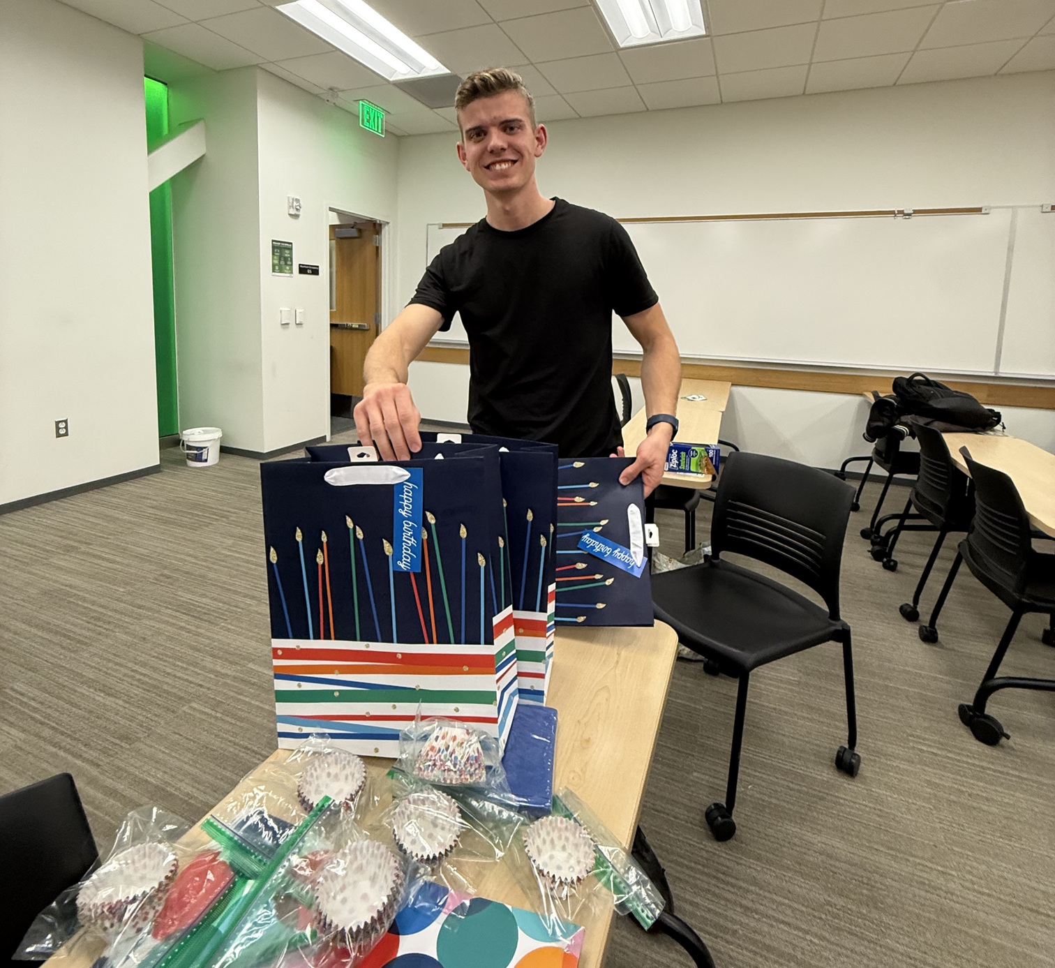 UIMF member, Curtis Bristol, putting birthday kit bags together