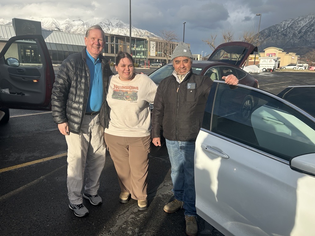 Dean Robinsion (Rotarin), Natalia Figueroa, Jaime Figueroa (Natalia’s Father) Celebrating