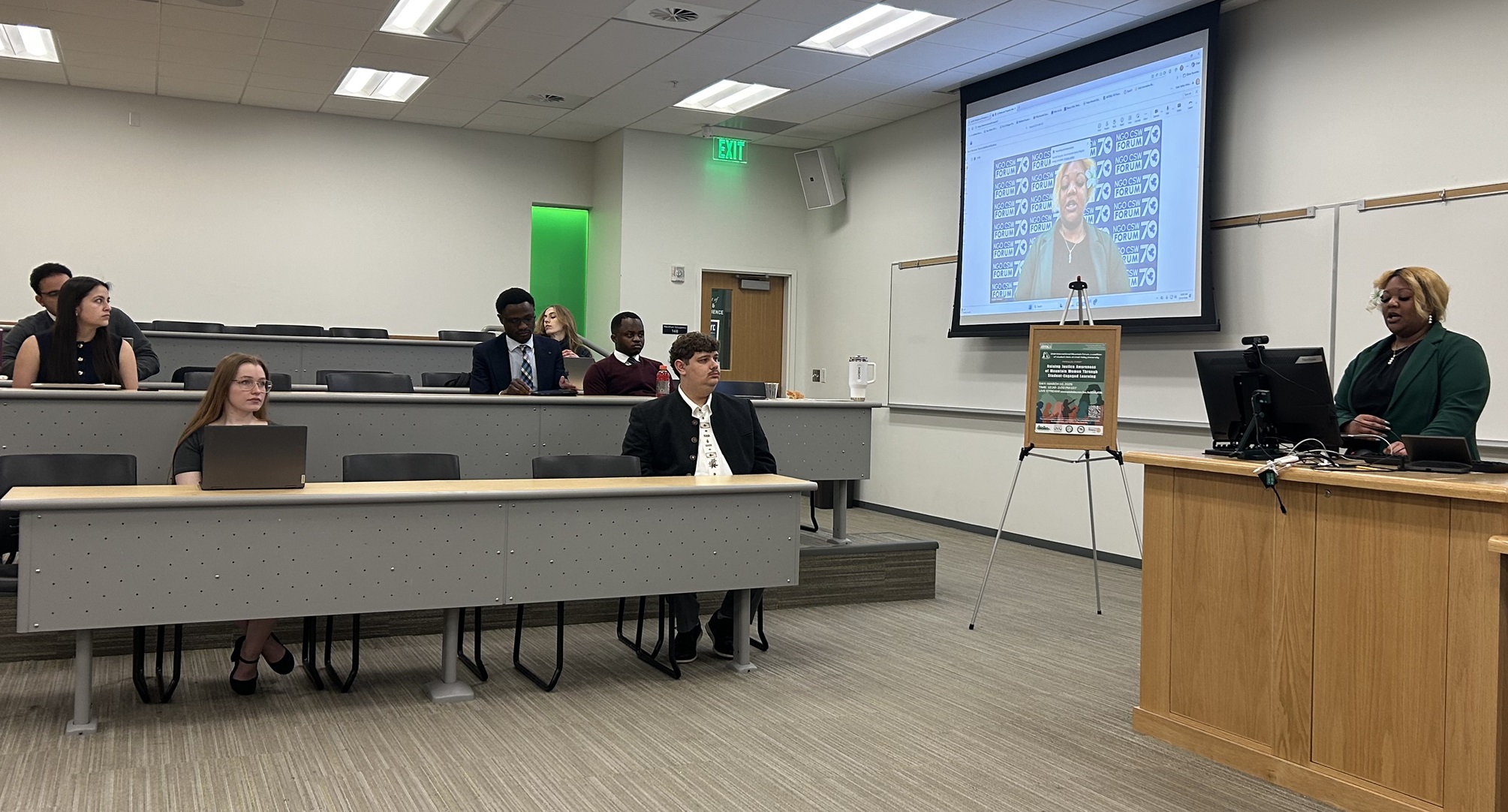 Janessa-Michelle Purcell, President of the UIMF greets participants of the event