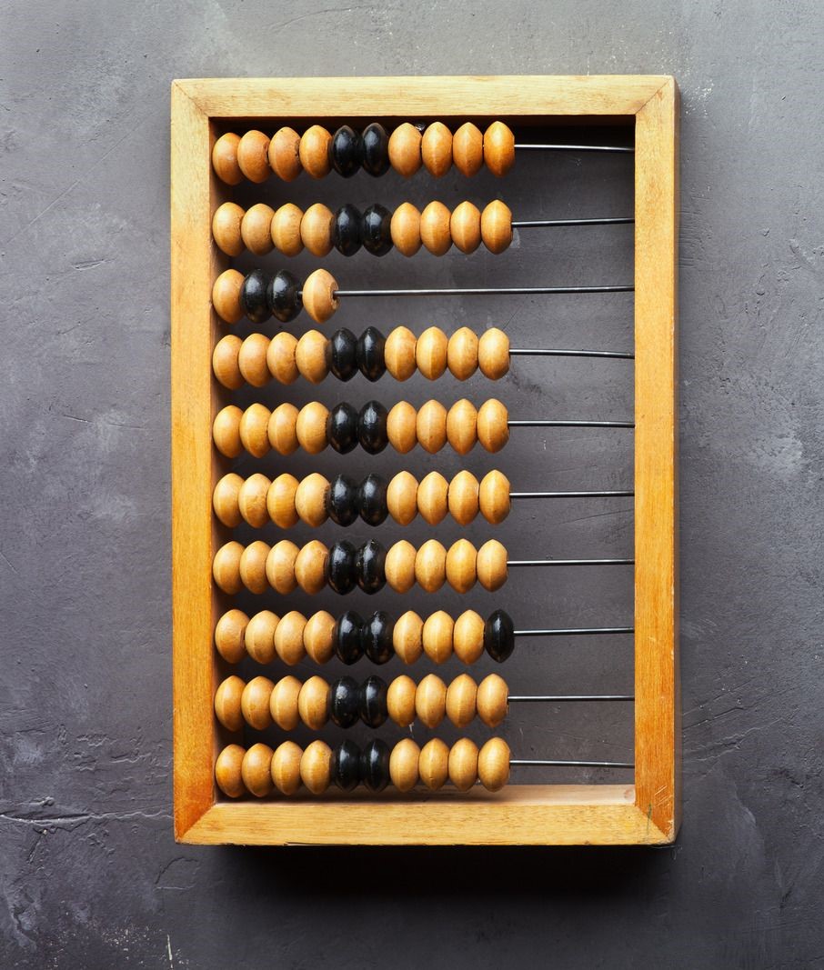 grey background with an orange abacus