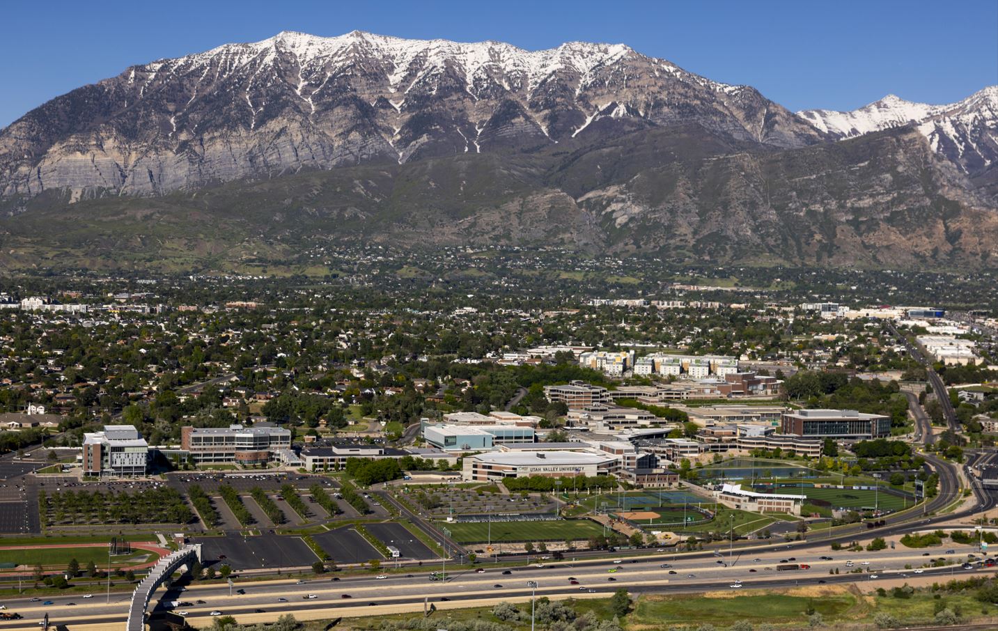 A college campus at the base of a large mountain